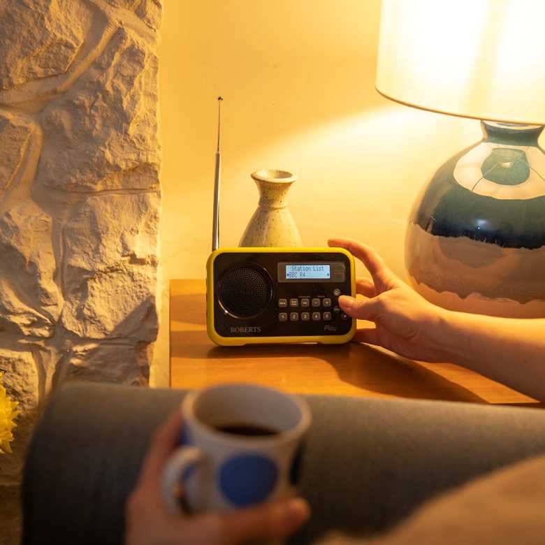 Listening to a radio in a cosy room